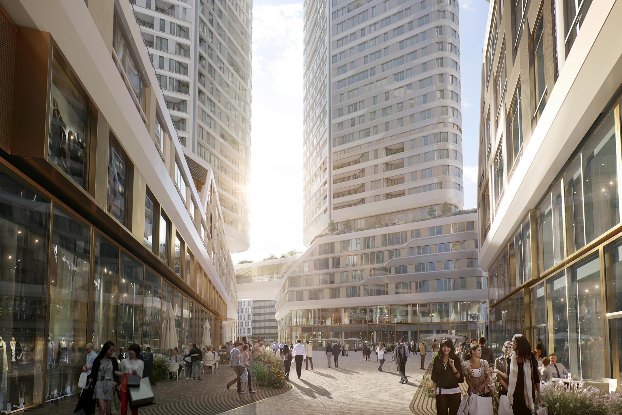 Blick auf das neue Hochhausquartier von einer belebten Straße aus.