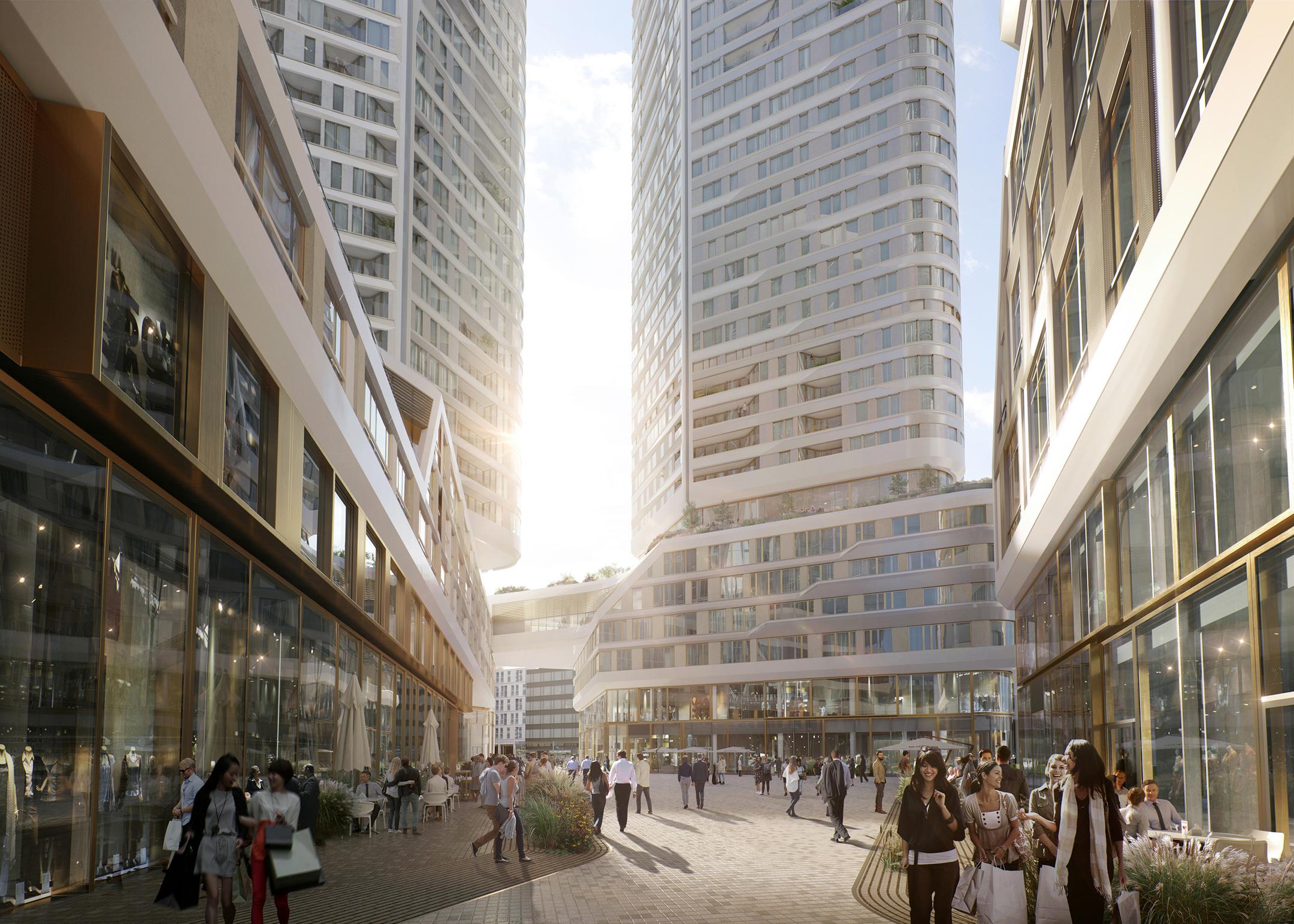 Blick auf das neue Hochhausquartier von einer belebten Straße aus.