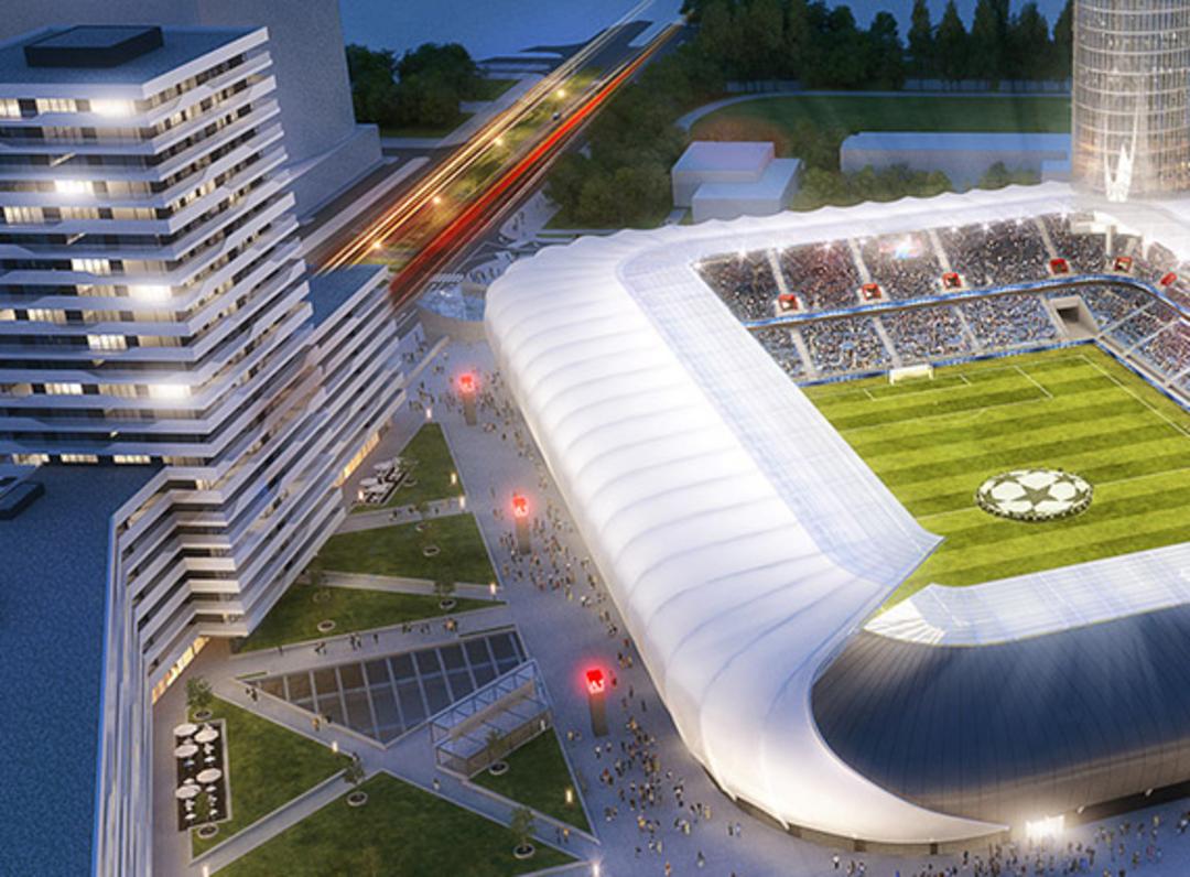 3D-Visualisierung einer Luftaufnahme mit Blick auf ein beleuchtetes Stadion mit begrüntem Vorplatz, nebenan ein modernes Gebäude