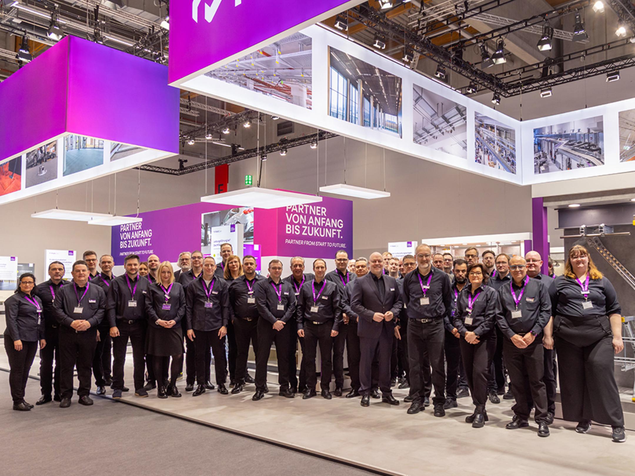 Messestand mit dem Messe-Team