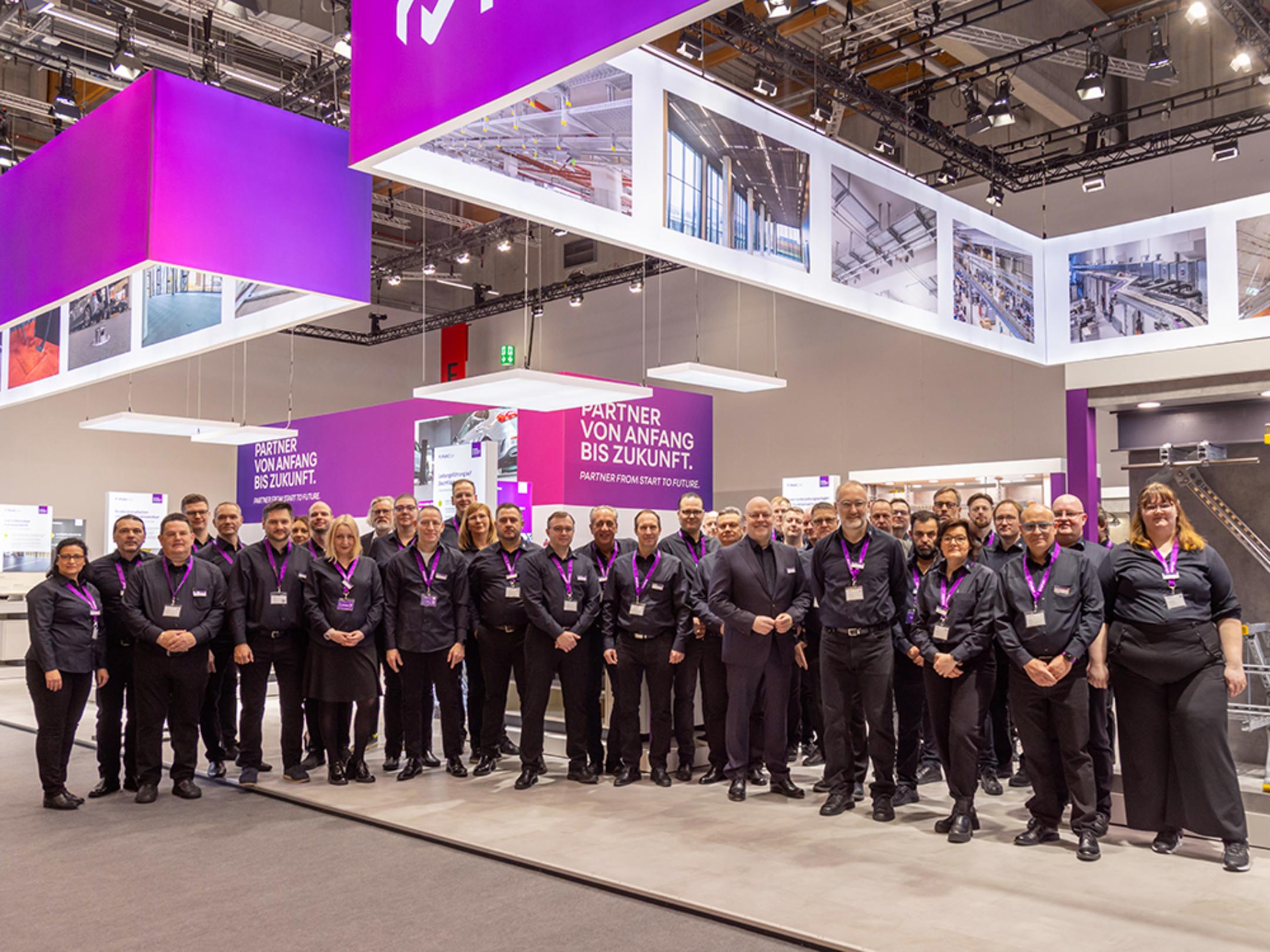 Messestand mit dem Messe-Team