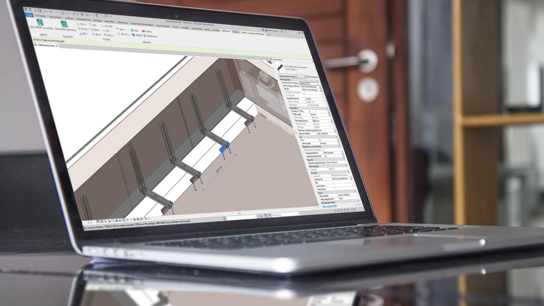 Laptop on which the BIM software Revit can be seen